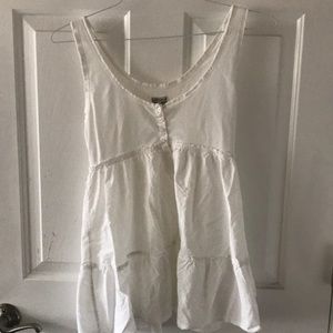 White scoopneck tank, loose bottom.